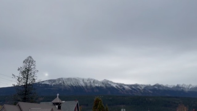 mountain summit with snow on it